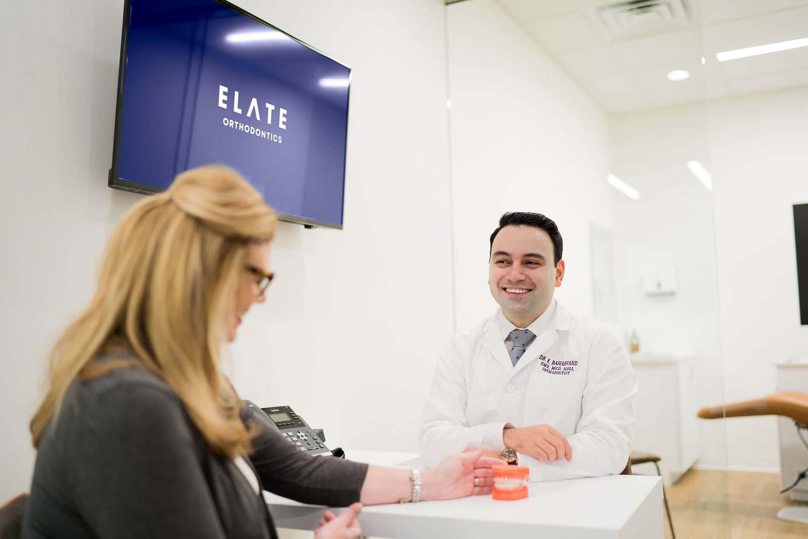 Family reviewing orthodontic financing options at Elate Orthodontics